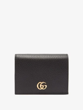SHOP GUCCI >
