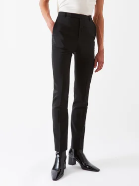 SHOP SAINT LAURENT >