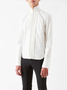 SHOP SAINT LAURENT >