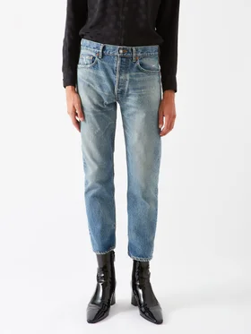 SHOP SAINT LAURENT >