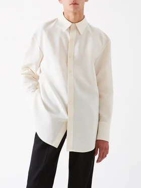 SHOP SAINT LAURENT >