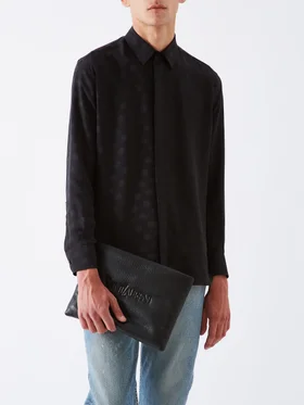 SHOP SAINT LAURENT >